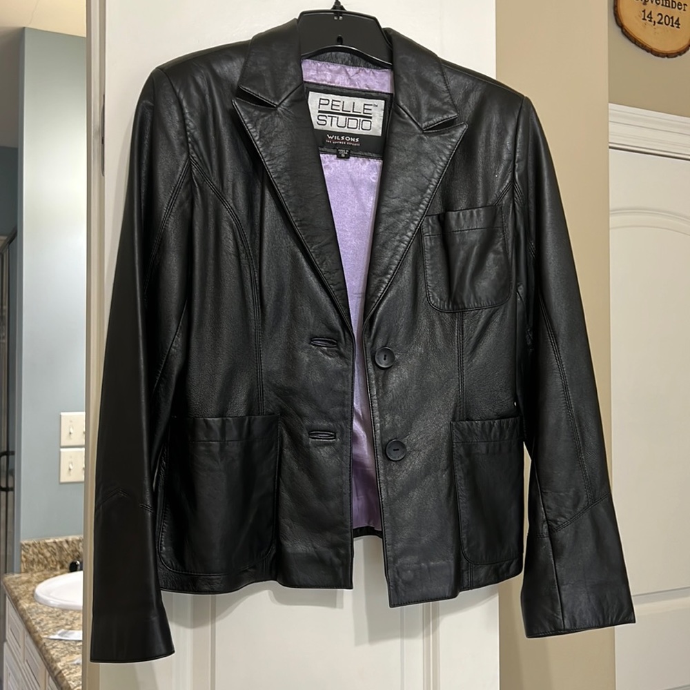 Wilson’s black leather jacket